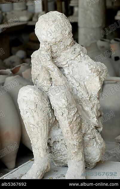 Plaster cast of a dying man in the forum granary, Pompeii, archaeological site near Naples, Campania, Italy, Europe.