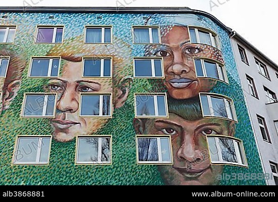 Façade with faces of different nationalities, wall painting, mural, Düsseldorf, North Rhine-Westphalia, Germany, Europe.