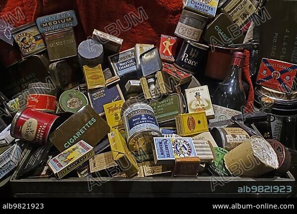 Collection of WW2 British boxes and cans with cigarettes; tobacco and matches distributed to allied soldiers during World War Two.