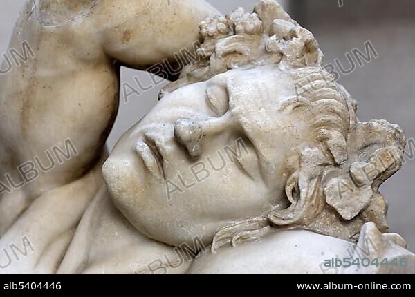 Large sleeping satyr (barberinian faun) in museum Glyptothek (collection of antique sculptures) in Munich, Upper Bavaria, Bavaria, Germany, Europe.