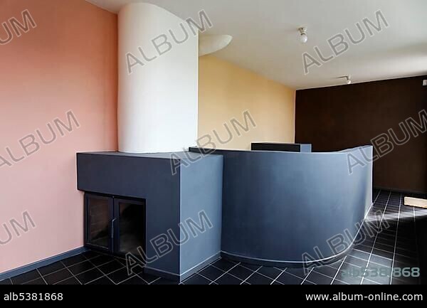 LE CORBUSIER. Library with fireplace, museum at the Corbusier house from 1927, Weissenhof Museum, Stuttgart, Baden-Wuerttemberg, Germany, Europe.