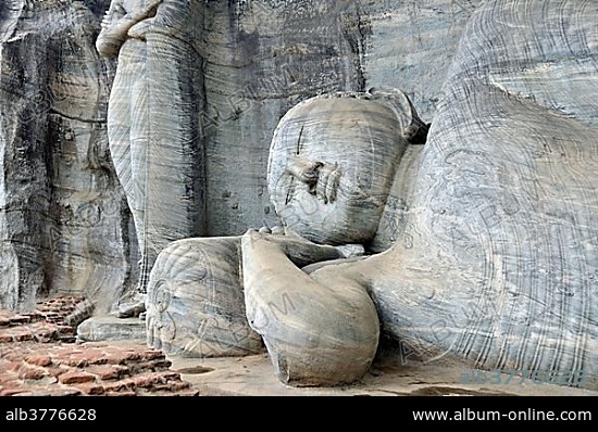 Reclining Buddha statue, entrance to Nirvana, Parinirvana, Gal Vihara, Polonnaruwa, Sri Lanka, Ceylon, Asia.