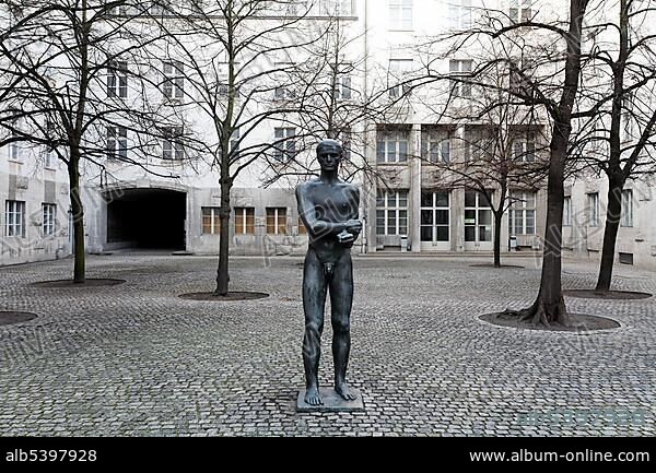 Young man with bound hands, sculpture, Memorial to the German Resistance in the courtyard of the Bendlerblock building, Berlin-Mitte, Germany, Europe.