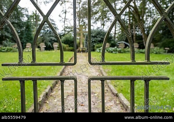 Entrance gate to the cemetery for Soviet prisoners of war from World War II, Tannenhausen war cemetery, Aurich, Lower Saxony, Germany, Europe.