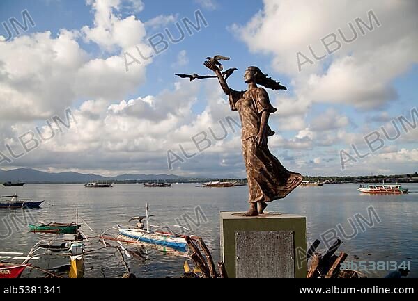 Female statue on the Baywalk, waterside promenade, capital Puerto Princesa, Palawan Island, Philippines, Asia.