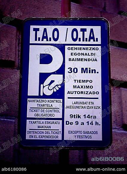 CARTEL DE APARCAMIENTO LIMITADO ESCRITO EN CASTELLANO Y VASCO.