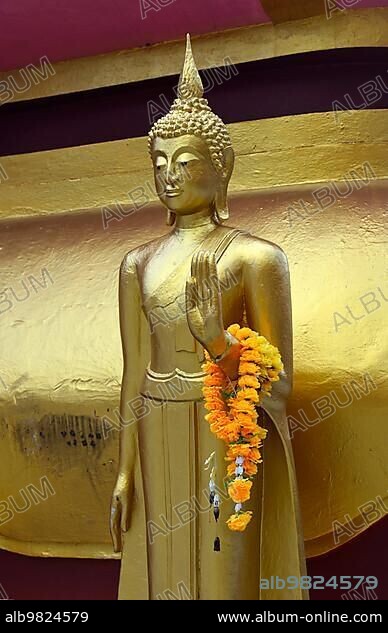 Standing Buddha figure with blessing hand posture; Great Buddha Temple; Wat Phra Yai; on Ko Phan; Koh Samui; Thailand; Asia.