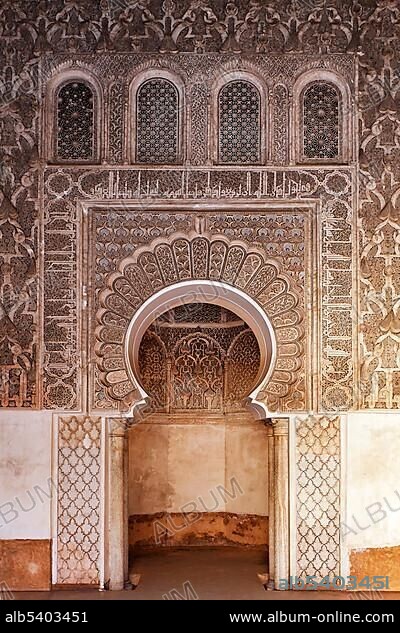 Stucco decorated Mihrab (praying alcove) Medersa Ali-Ben-Youssef, Medina, Marrakech, Morocco, Africa.