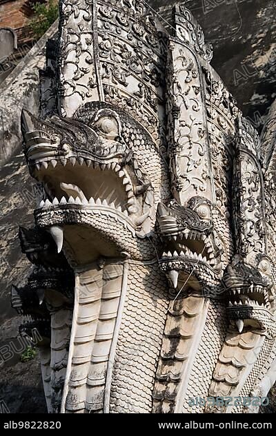 Naga serpents sculpture in Wat Chedi Luang Temple in Chiang Mai; Thailand; Asia.