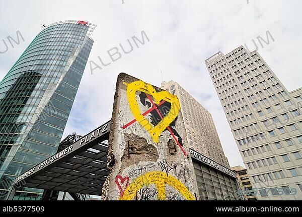 Remains of Berlin Wall at Potsdamer Platz, Potsdam Square, BahnTower on the left, Beisheim Centre on the right, Berlin, Germany, Europe.