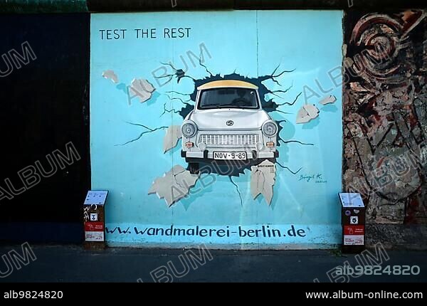Birgit Kinder; Trabbi; Trabant (Test the Rest); artwork on the former Berlin Wall; graffiti; East Side Gallery; Berlin; Germany; Europe.