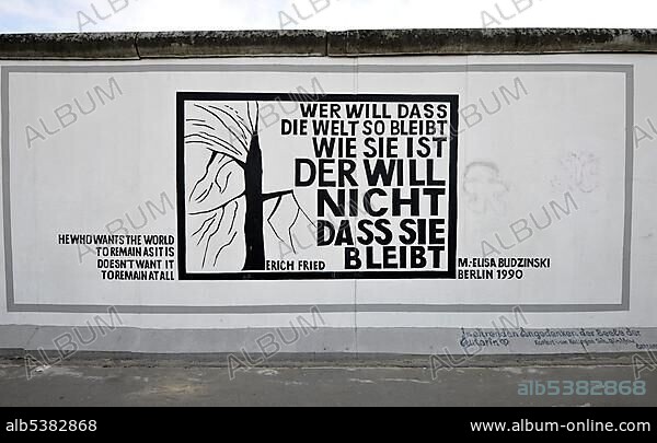 Elisa Budzinski, Art and the Berlin Wall, Aphorismus by Erich Fried, painting on a remaining segment of the Berlin Wall, East Side Gallery, Friedrichshain-Kreuzberg, Berlin, Germany, Europe.