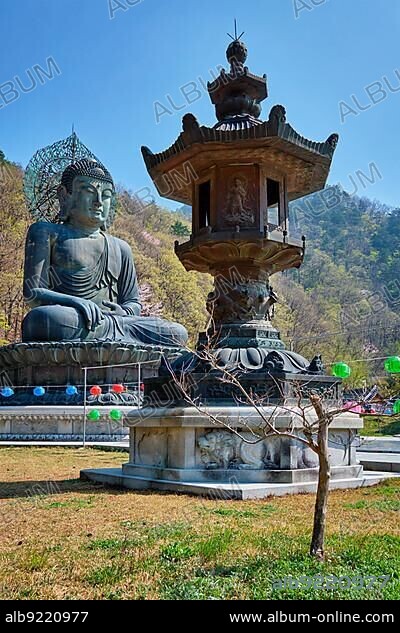 SEORAKSA, SOUTH KOREA, APRIL 15, 2017: The Great Unification Buddha Tongil Daebul is a 14. 6-meter 108 ton Bronze Buddha statue in Seoraksan National Park, South Korea, Asia.