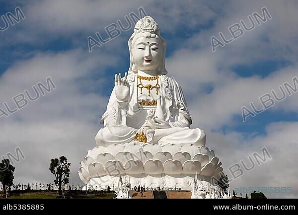 Giant Guan Yin statue at Wat Huay Pla Kang Temple, sitting Buddha on lotus flower, Chiang Rai, Northern Thailand, Thailand, Asia.