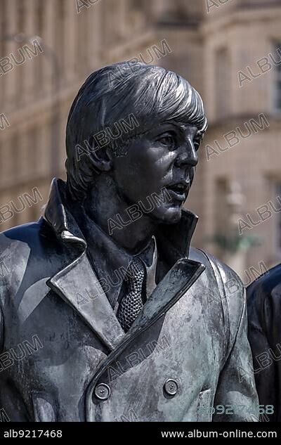 LIVERPOOL, UK - JULY 14 : Statue of Paul McCartney of the Beatles in Liverpool, England on July 14, 2021.