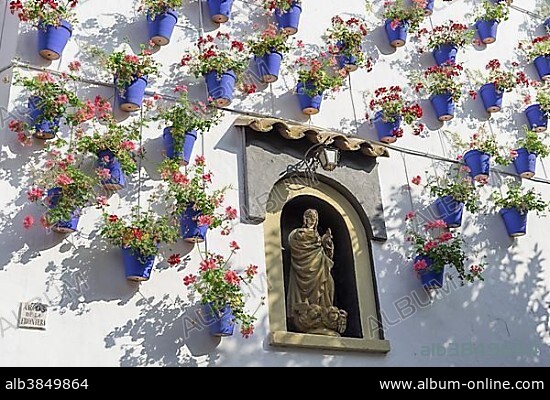Blue flower pots on the wall, Open Air Museum Spanish Village, Poble Espanol de Montjuic, Barcelona, Catalonia, Spain, Europe.