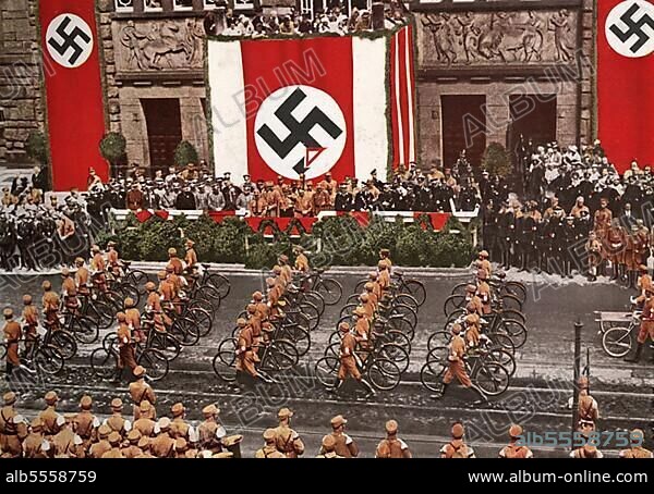 Adolf Hitler (* 20 April 1889 in Braunau am Inn) († 30 April 1945 Berlin), Leader of the Nazi Party, Reich Chancellor from 1933, also self-appointed "Fuehrer" and head of state of Germany.