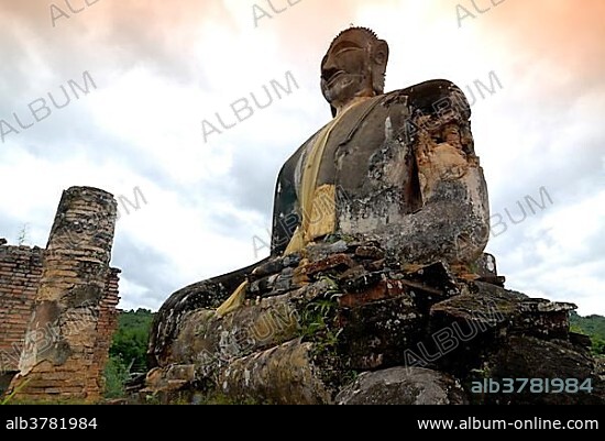 Soot covered Buddha statue of the Buddhist temple of Wat Phia Wat which was bombed in 1966 during the Vietnam War, Muang Khun, Old Xieng Khuang, province of Xieng Khouang, Laos, Southeast Asia, Asia.