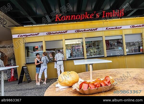 Konnopke's Imbissbuden, cult snack stand in Berlin's Prenzlauer Berg district. Konnopke's is considered the first snack stand in East Berlin, where the currywurst was introduced in 1960, Berlin, Germany, Europe.