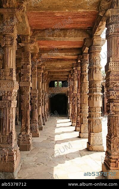 Richly decorated stone pillars at Qutb Minar, Delhi, India, Asia.