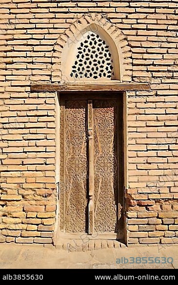 Old door in the historic adobe town of Khiva, Chiva, Ichan Kala, Silk Road, Unesco World Heritage Site, Uzbekistan, Central Asia, Asia.