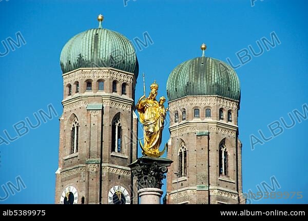 Column of Maria between towers of church Frauenkirche Marienplatz Munich Bavaria Germany.