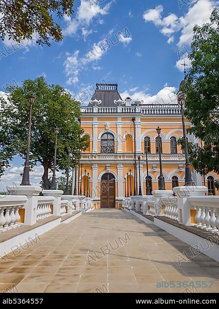 The Manuc Bei mansion, an architectural, culture and historic complex with museum, winery and other edifices located in Hincesti city, Moldova. Manuc Bey palace facade and yard in a sunny summer day.