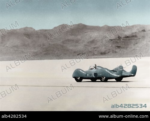 French racing driver Jean Hébert driving the Renault Etoile Filante, setting a world speed record at 308.85 km/h.. United States, Great Salt Lake, September 5, 1956.