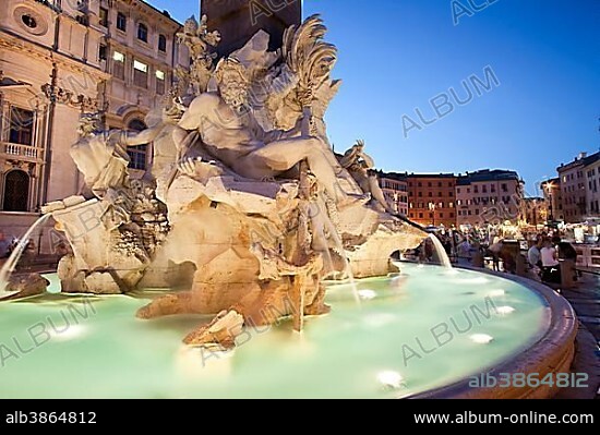 Fontana dei Quattro Fiumi, Fountain of the Four Rivers by Bernini in the evening twilight, Piazza Navona, Rome, Italy, Europe.