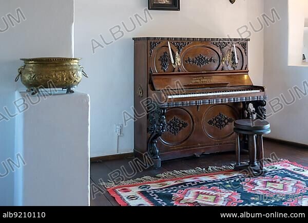 BRAN, TRANSYLVANIA/ROMANIA - SEPTEMBER 20 : View of a piano in Dracula's Castle in Bran Transylvania Romania on September 20, 2018.