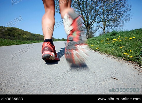 Running shoes, recreational runner jogging.