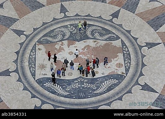 Compass rose with world map in the pavement in front of the Padrao dos Descobrimentos, Monument to the Discoveries, Belem, Lisbon, Lisbon District, Portugal, Europe.