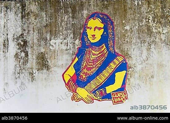 Leonardo da Vinci's Mona Lisa wearing an Indian Sari from the series Guess Who, unknown artist, graffiti on a wall in Kochi, international art exhibition of contemporary art Kochi Muziris Biennale 2014 Kerala, India, Asia.