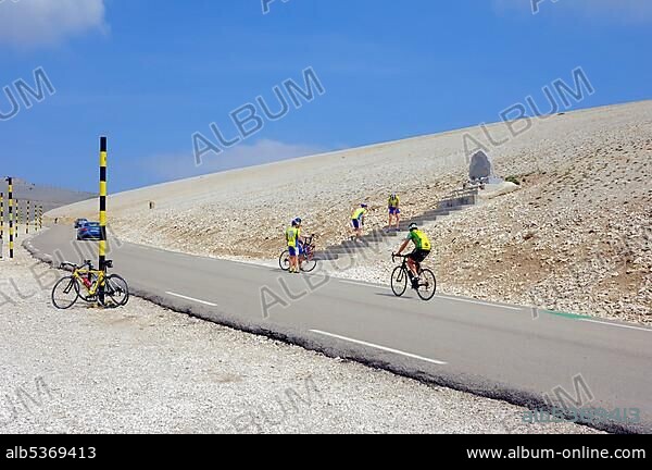 Racing cyclist at the memorial for the professional cyclist Tom Simpson, on the road to the summit of Mont Ventoux, Vaucluse, Provence-Alpes-Cote d'Azur, Southern France, France, Europe, PublicGround, Europe.