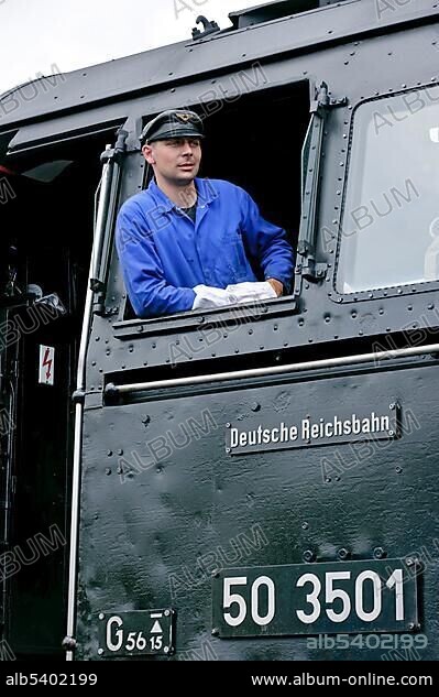 Driver of class 50 steam locomotive no. 50 3501 at the German Steam Locomotive Museum, Neuenmarkt, Franconia, Bavaria, Germany, Europe.