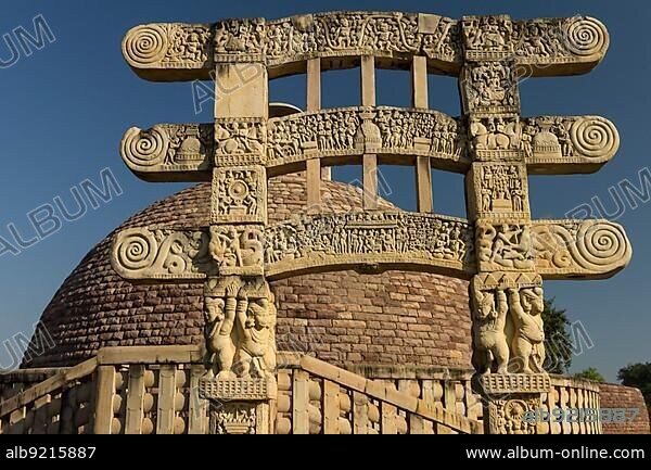 Stupa 3 with a single torana, gateway. Yakshas hold the columns of the gate. Buddhist Monuments at Sanchi. UNESCO World Heritage Site. Sanchi, Madhya Pradesh, India, Asia.