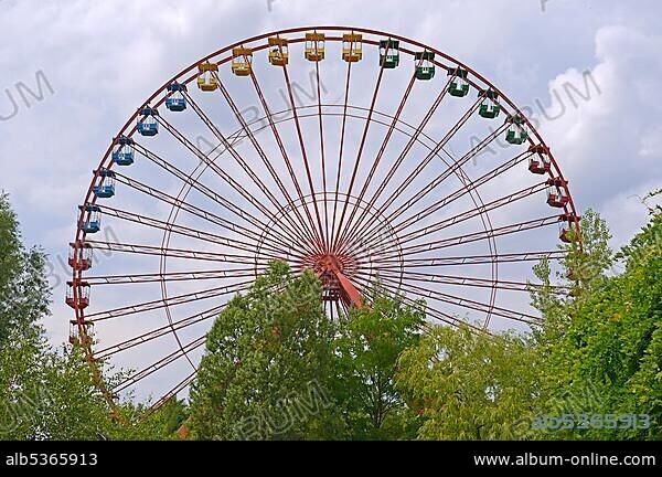 Concealed view of the 45-meter-high Ferris wheel in the former Spreepark Berlin amusement park, formerly known as Kulturpark Plaenterwald in the German Democratic Republic, Germany, Europe.