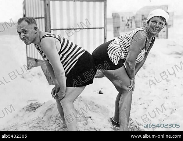 Funny couple at the beach, historic photograph, around 1926.
