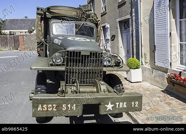 WW2 U. S. Army GMC CCKW 2½-ton 6x6 cargo truck with winch and machine gun ring, used during the Normandy invasion.
