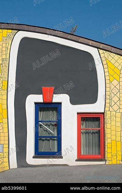 Colourful facade at Rogner Bad Blumau hotel complex, designed by architect Friedensreich Hundertwasser, in spa town Bad Blumau, Styria, Austria, Europe.