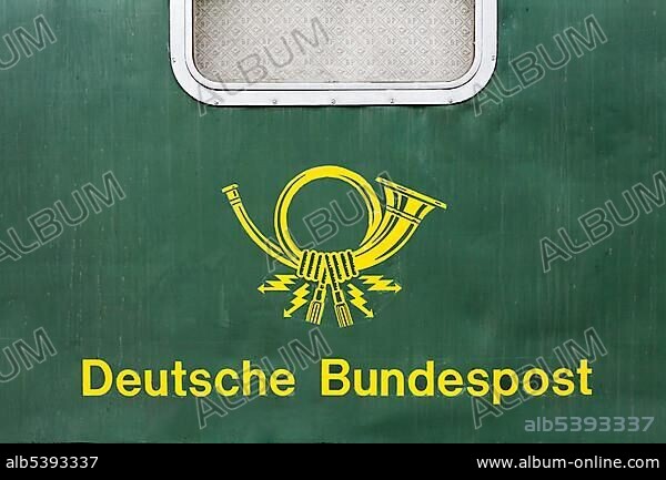 Historic wagon of the German Federal Mail with old post horn logo, circa 1960, Germany, Europe.