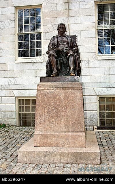 John Harvard statue by Daniel Chester French on the campus of Harvard University, Cambridge, Massachusetts, USA, North America.