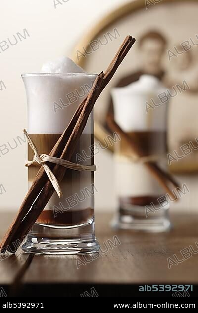 Two Latte Macchiato Nougat with cinnamon flavour and cinnamon sticks.