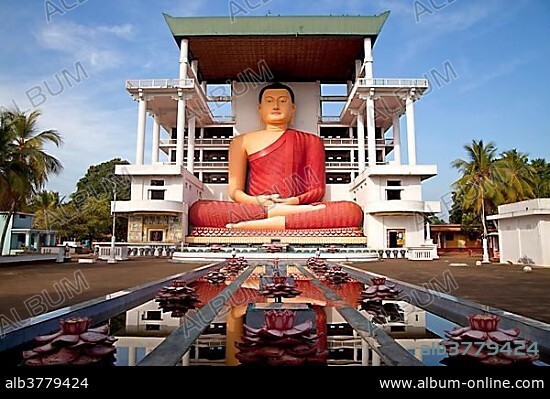 Giant Buddha statue in the Weherahena temple of Matara, Sri Lanka, Asia.