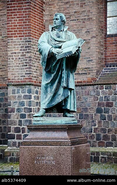 Statue of Martin Luther outside Marienkirche church, Berlin, Germany, Europe.