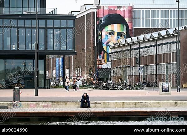 Anne Frank portrait on the façade of the Straat Museum; NDSM Plein; Amsterdam; Netherlands.