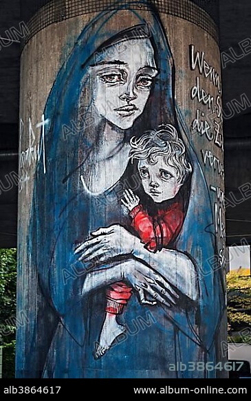 Graffiti on concrete pillars, refugee mother with child, Canditplatz, Munich, Bavaria, Germany, Europe.
