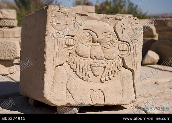 Protective God Bes, relief on a block of stone, Temple of Philae, Assuan, Egypt, Africa.