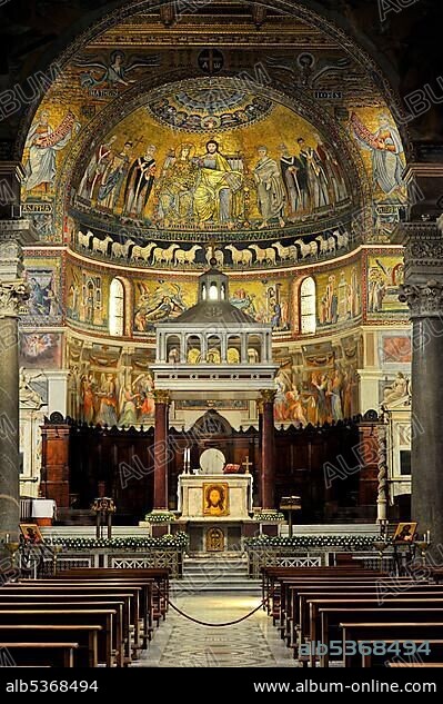 Nave with triumphal arch, altar with marble ciborium or canopy and apse mosaics by Cavallini Basilica Santa Maria in Trastevere, Rome, Lazio, Italy, Europe.