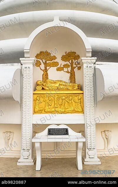 Buddha sculpture. The Parinirvana. Plastic art at the Stupa of the Japanese Peace Pagoda on top of the Rumassala hill in the jungle of Unawatuna.